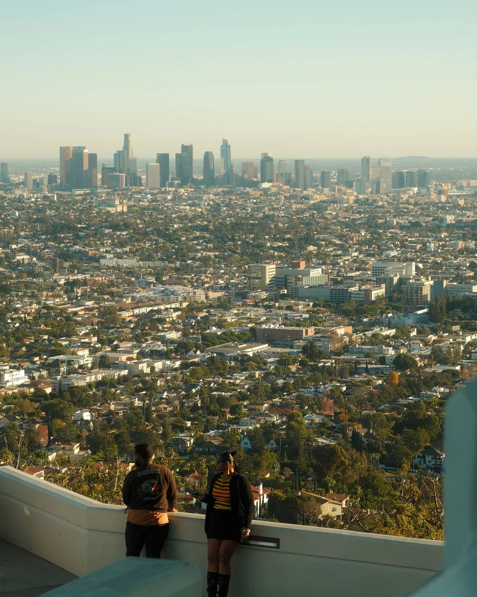 Downtown Los Angeles, CA skyline beyond miles of neighborhoods, seen from Griffith Observatory