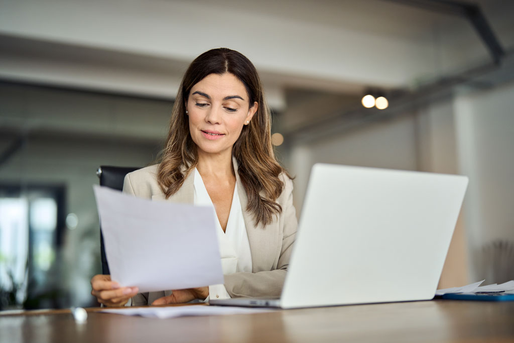A tax professional reviewing client documents