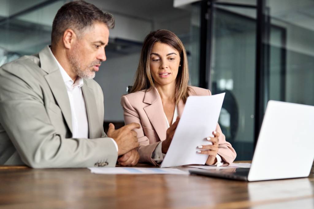 A tax attorney helping a client.