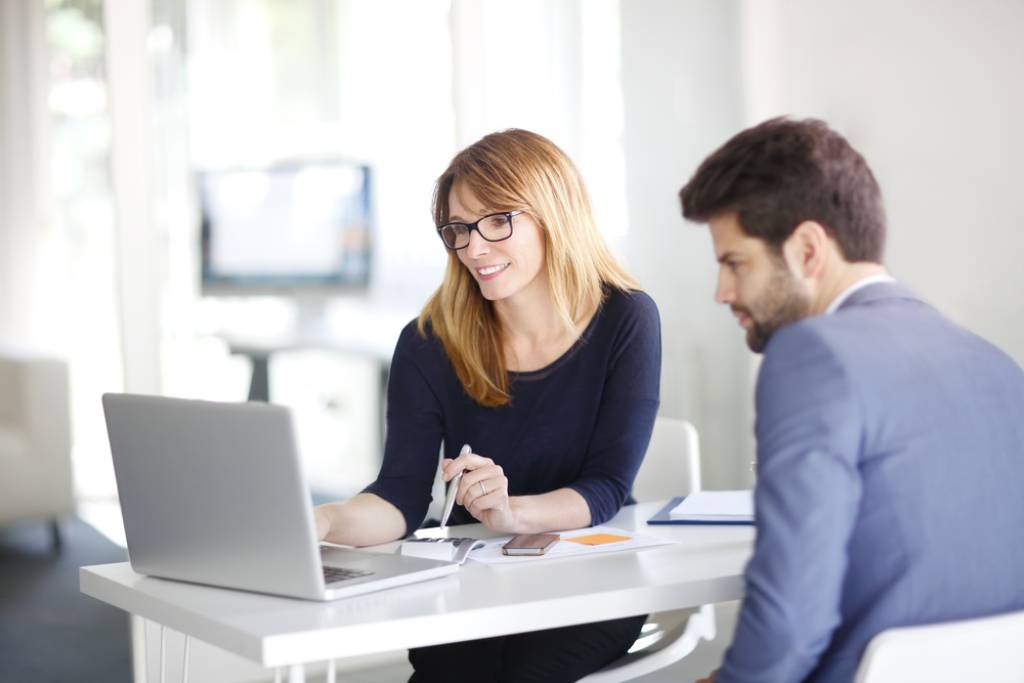 Businesswoman and client in office