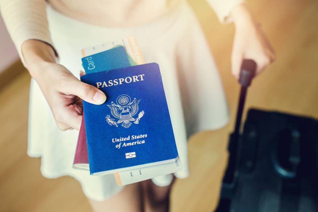 Person holding a passport 